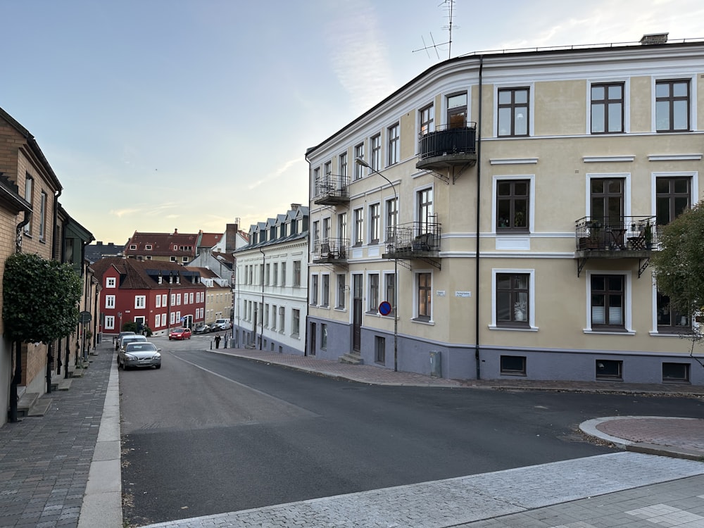 a street with cars parked on both sides of it