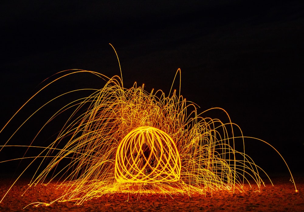 a long exposure photo of a firework display