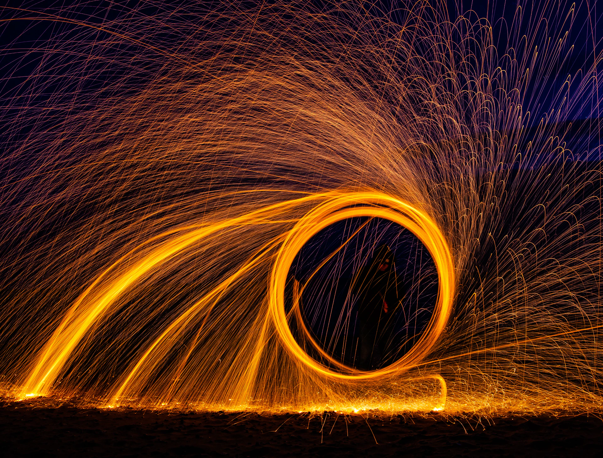 a circular of fire spinning in the air