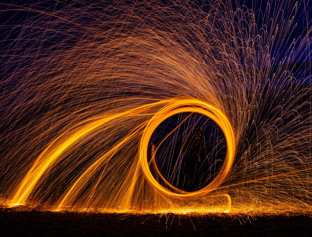 a circular of fire spinning in the air