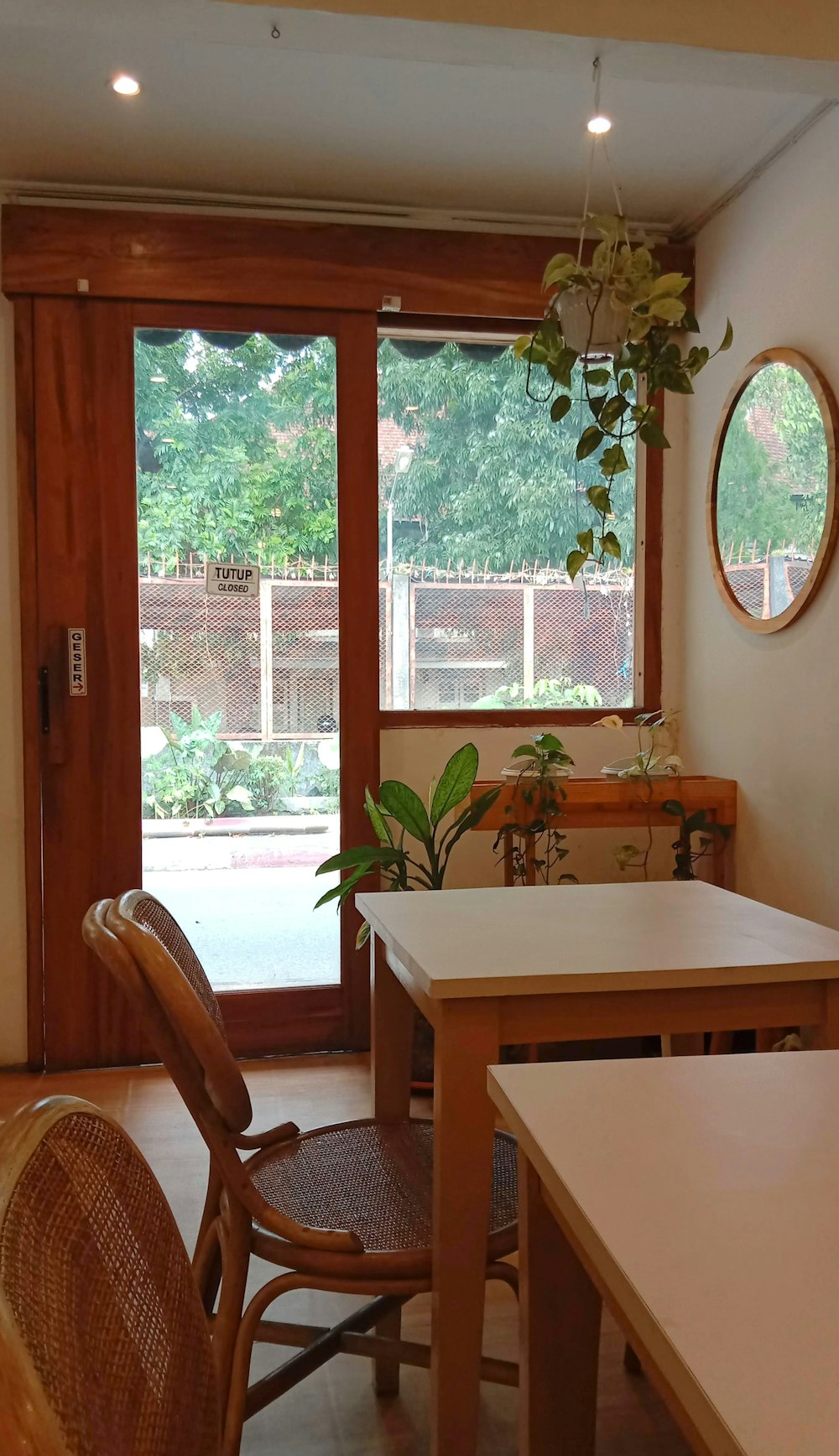 a table and chairs in a room with a sliding glass door