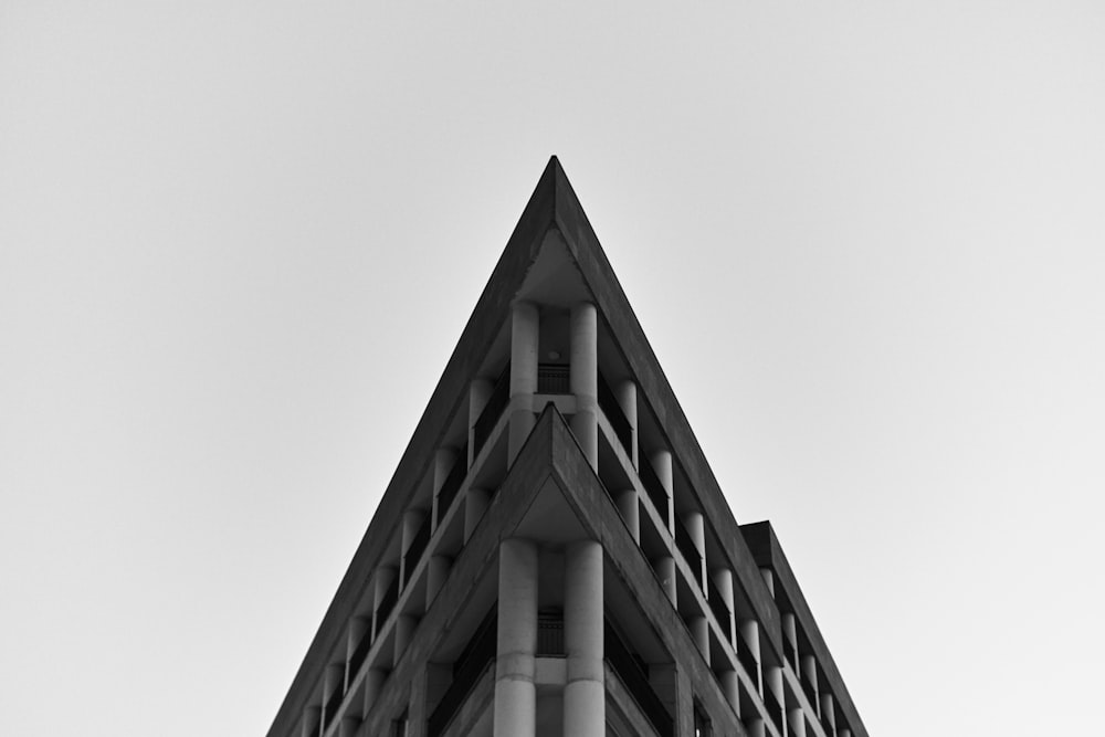 a black and white photo of a tall building