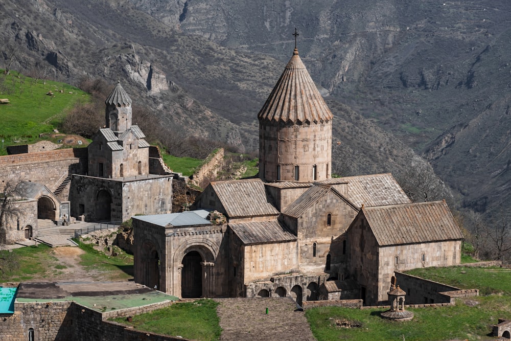 an old church with a steeple in the background