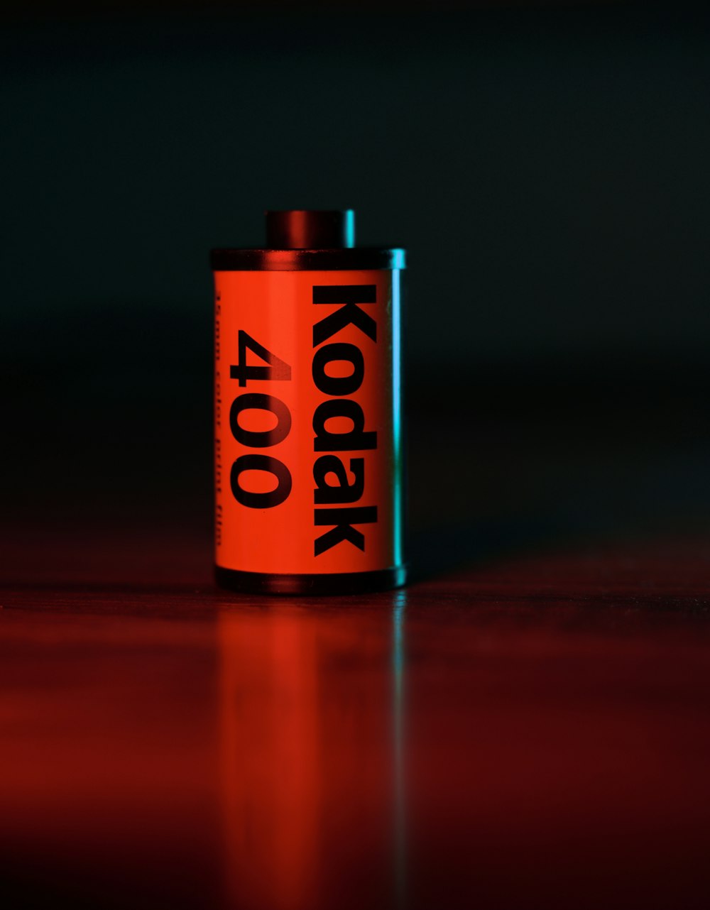 a close up of a can of kodak on a table
