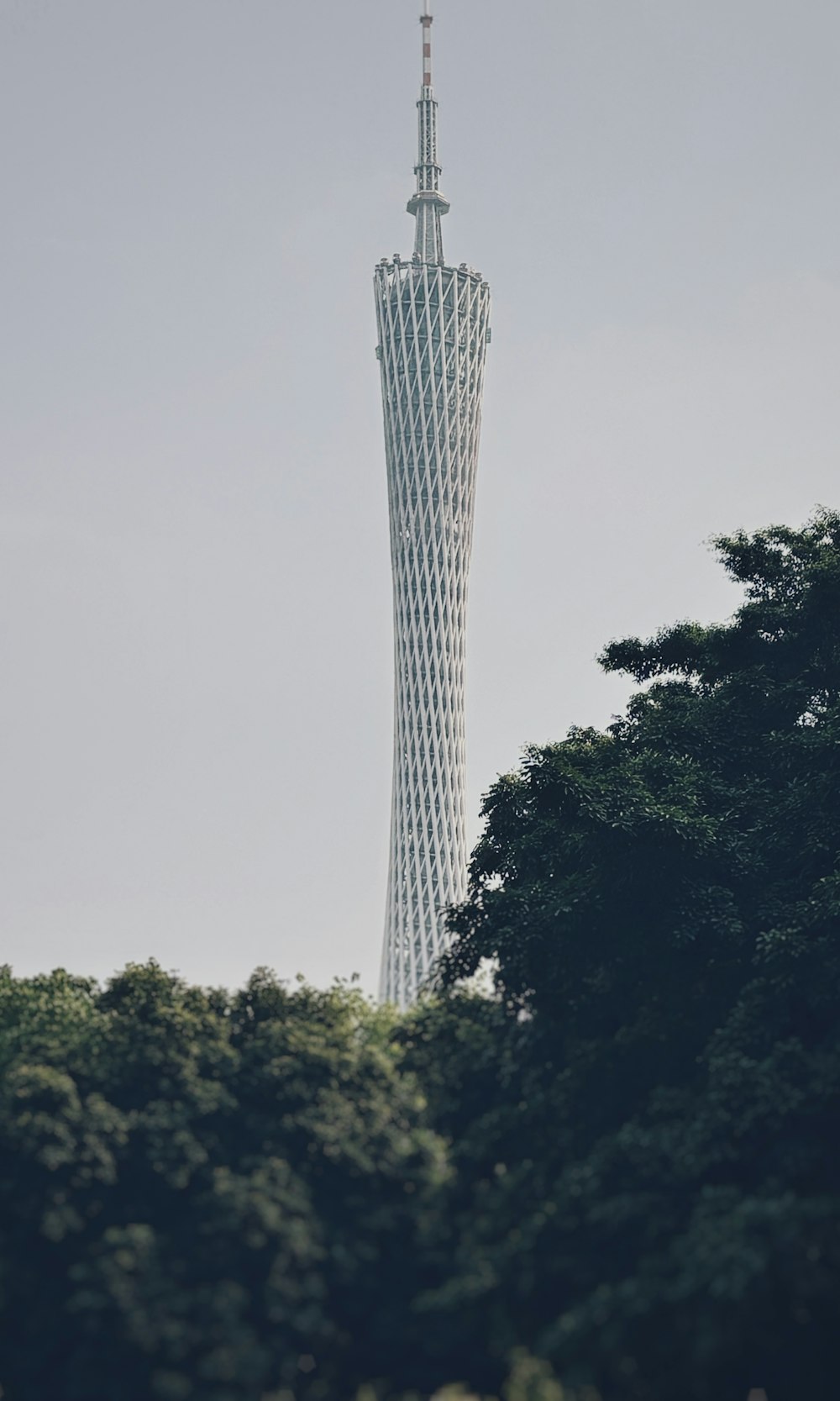 a tall tower with a clock on the top of it