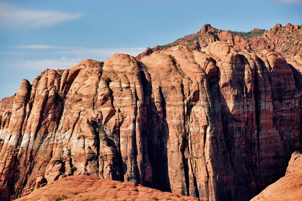 a rocky mountain with a sky background