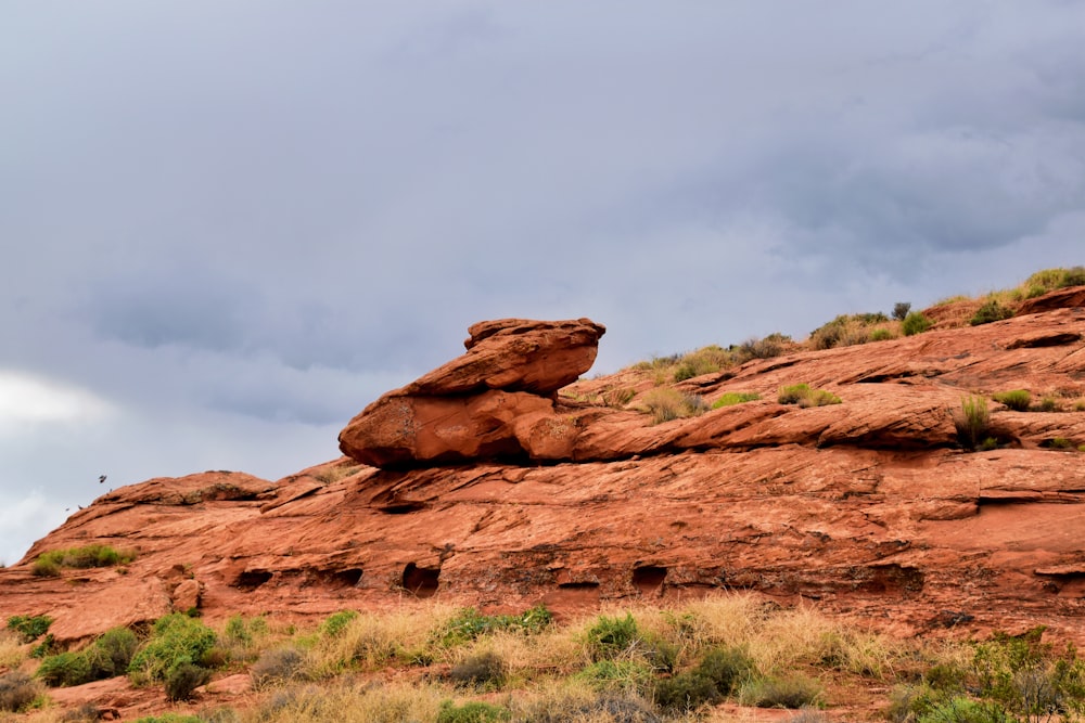 a rock formation in the middle of a desert