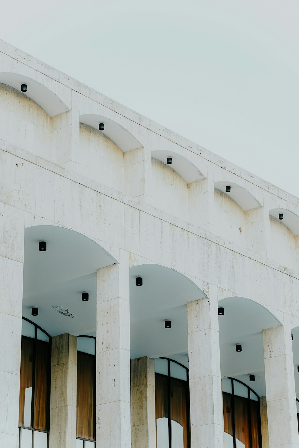 a row of windows on the side of a building