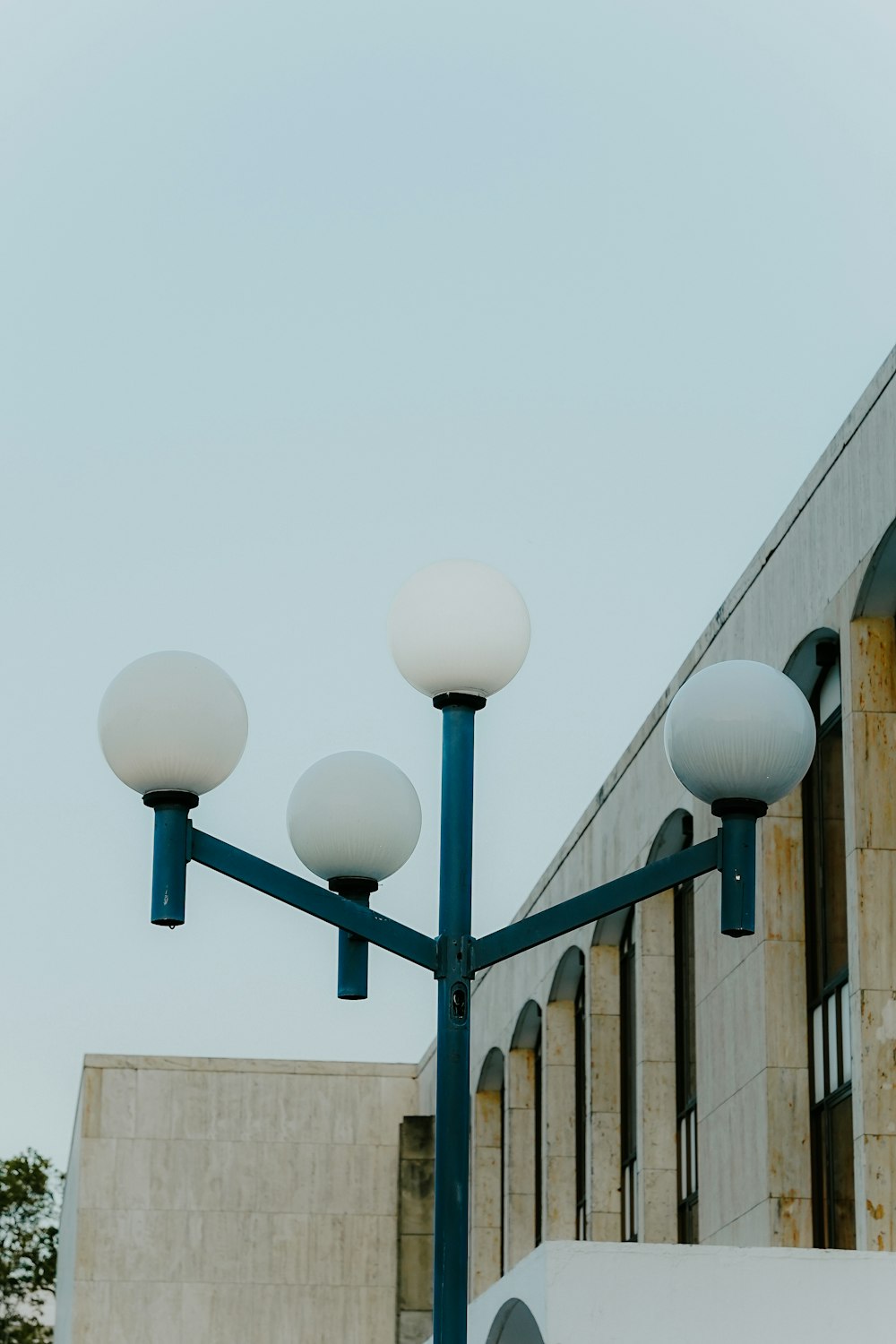 a building with a bunch of lights hanging off of it's side