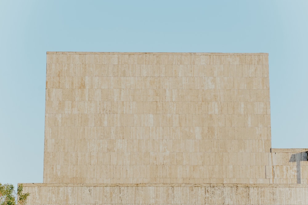 a tall building with a clock on the side of it