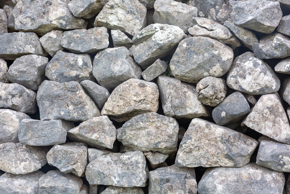 a pile of gray rocks sitting next to each other