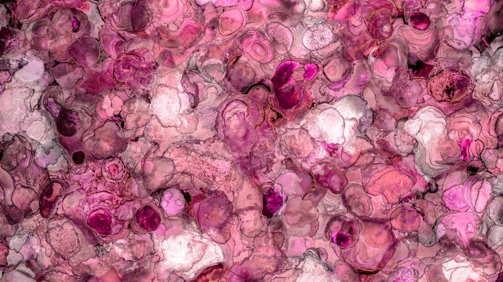 a close up of a pink marble texture
