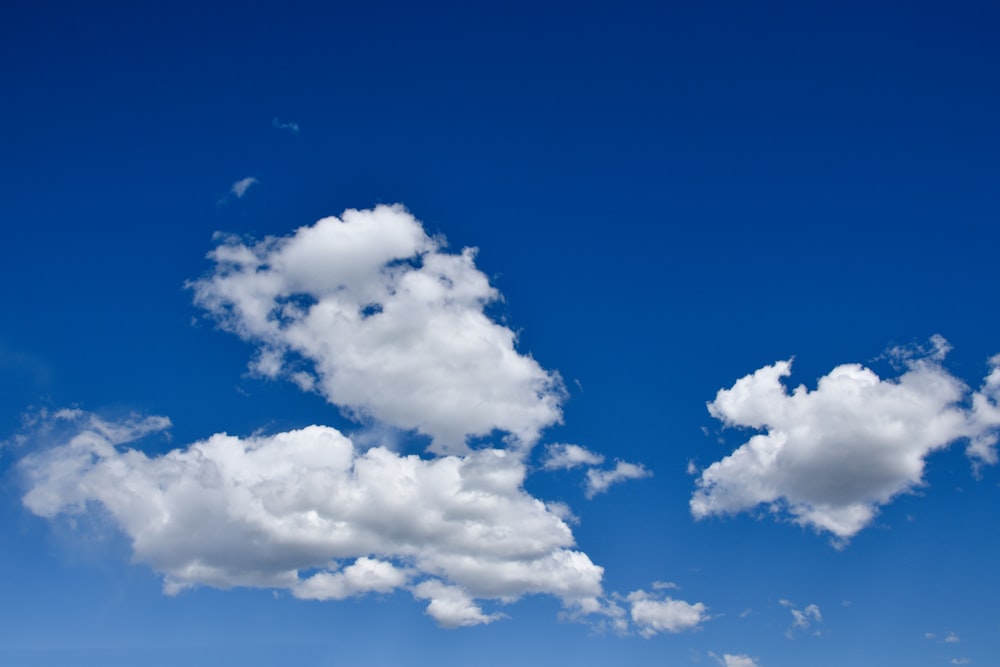 a blue sky with some clouds in it