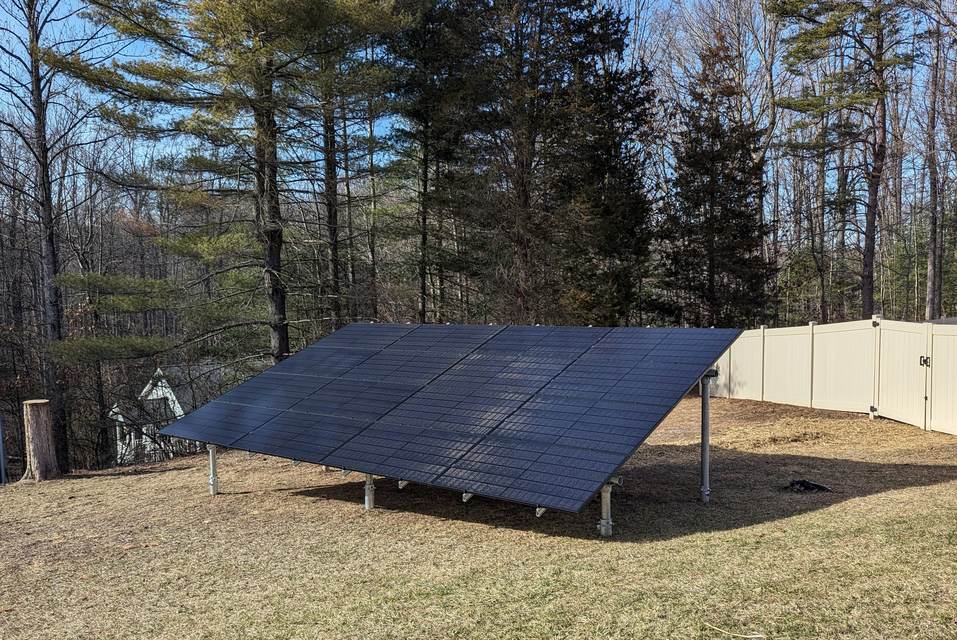 a large solar panel sitting in the middle of a field