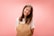 a woman in overalls posing for a picture