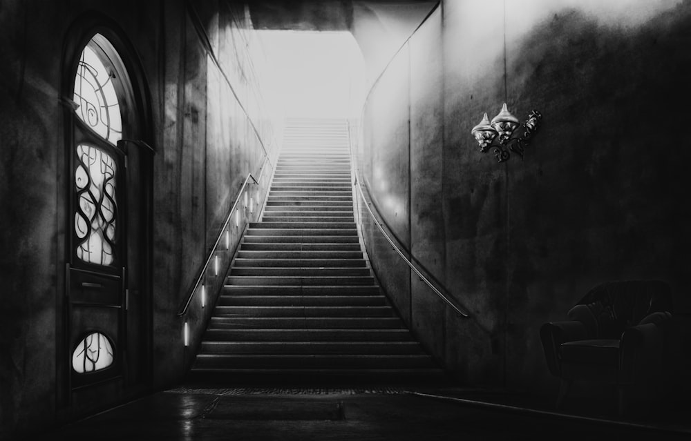 a black and white photo of a stairway