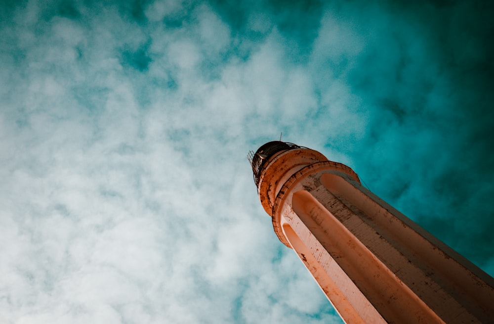 a tall tower with a sky in the background