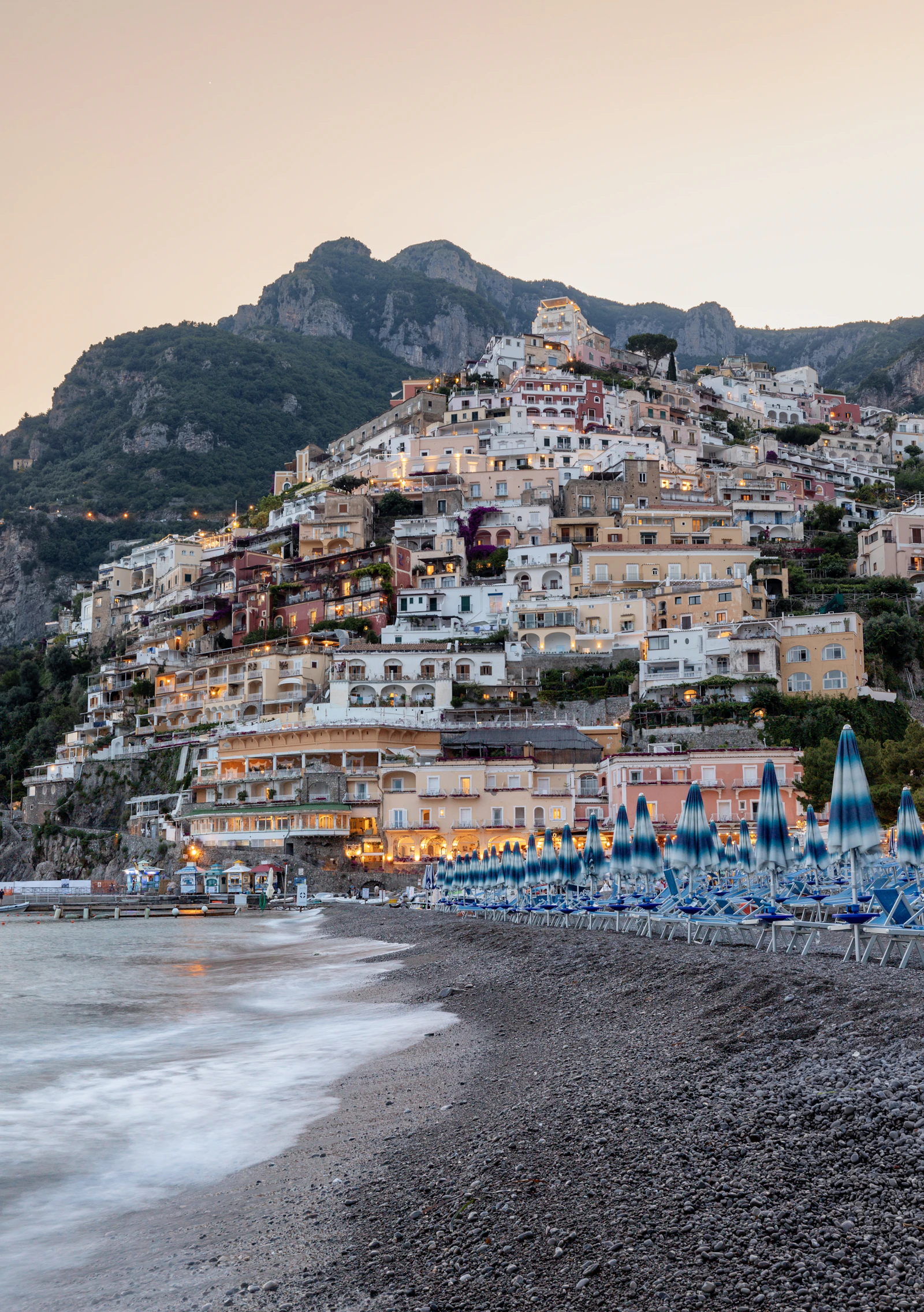 Rows of beach umbrellas on the sand at Positano