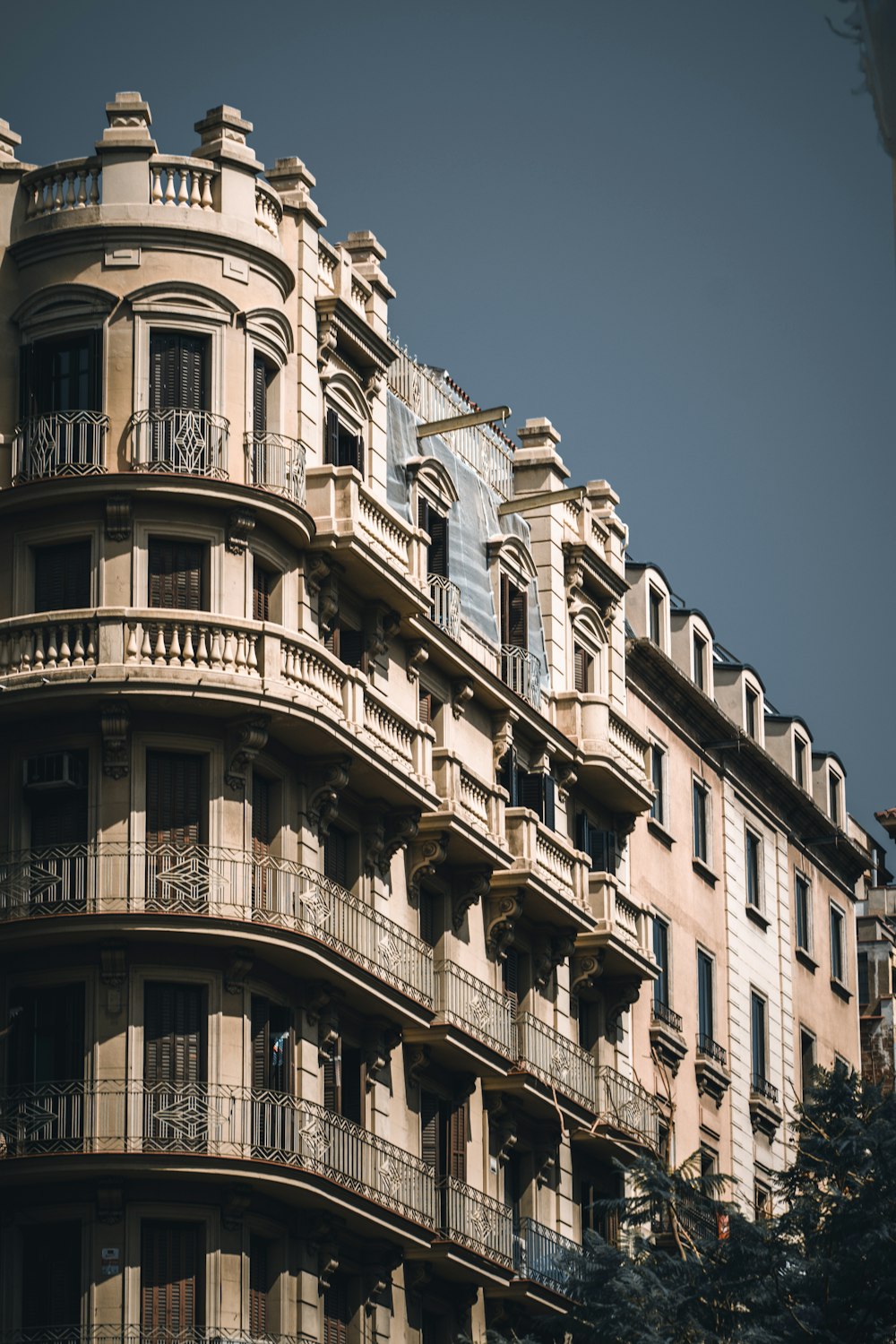 a tall building with balconies and balconies on the balconies