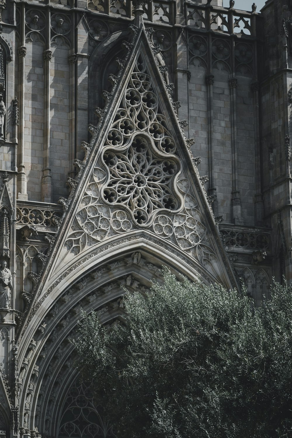 a large cathedral with a clock on the front of it