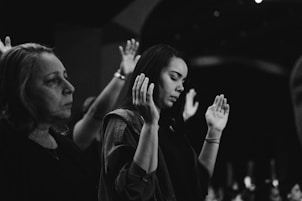 a group of women standing next to each other