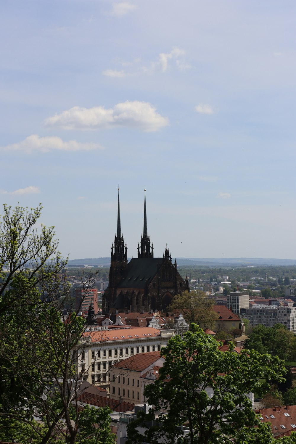 a view of a city from the top of a hill