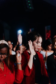 a group of women standing next to each other