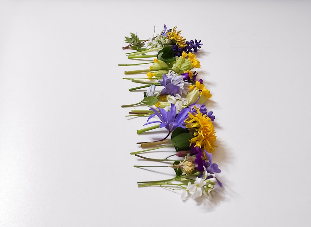 a bunch of flowers that are laying on a table