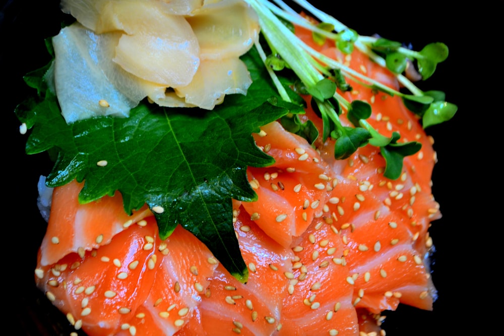 a close up of a plate of food with salmon