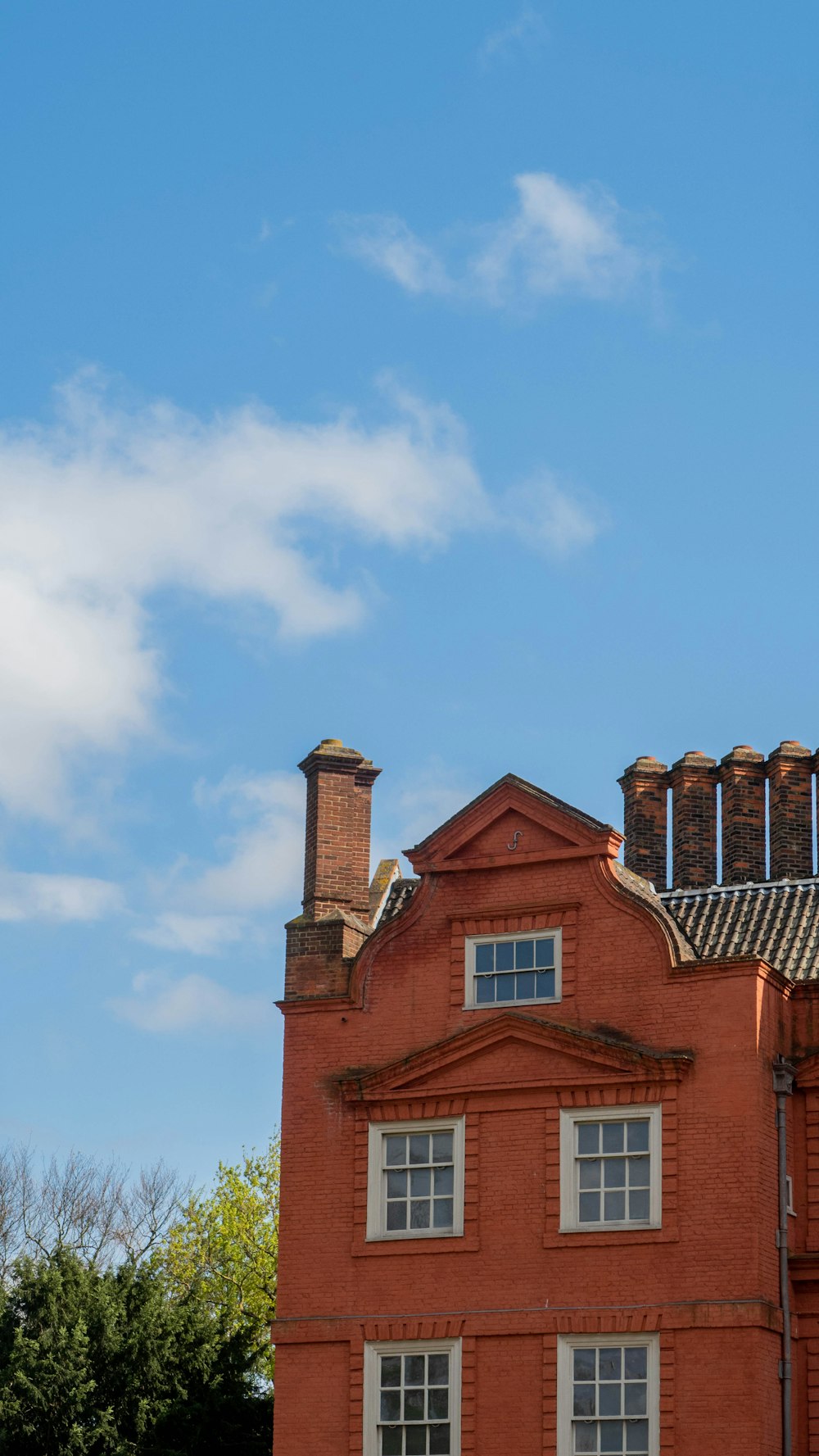 a red brick building with a clock tower on top