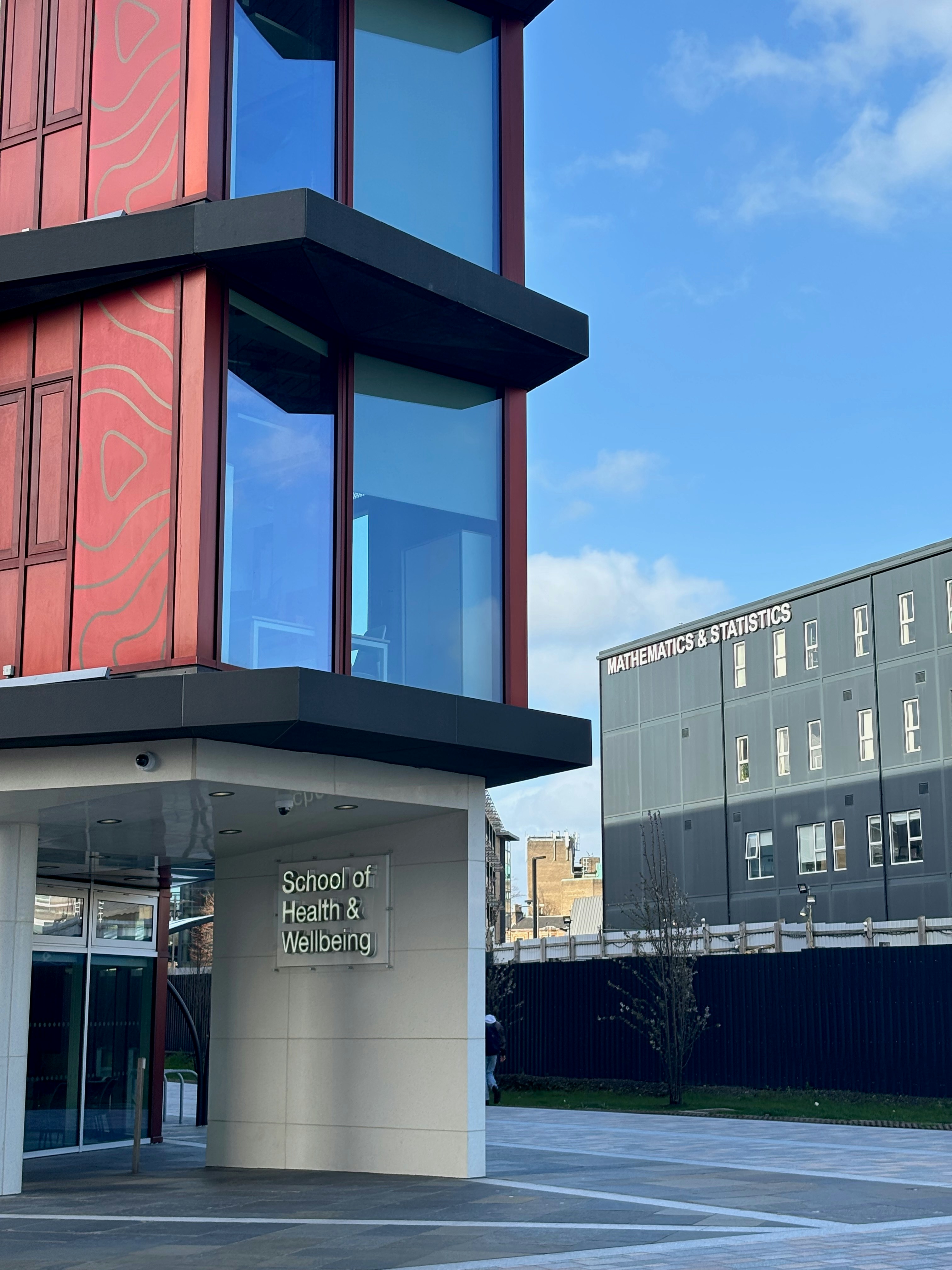 a tall building with a clock on the front of it