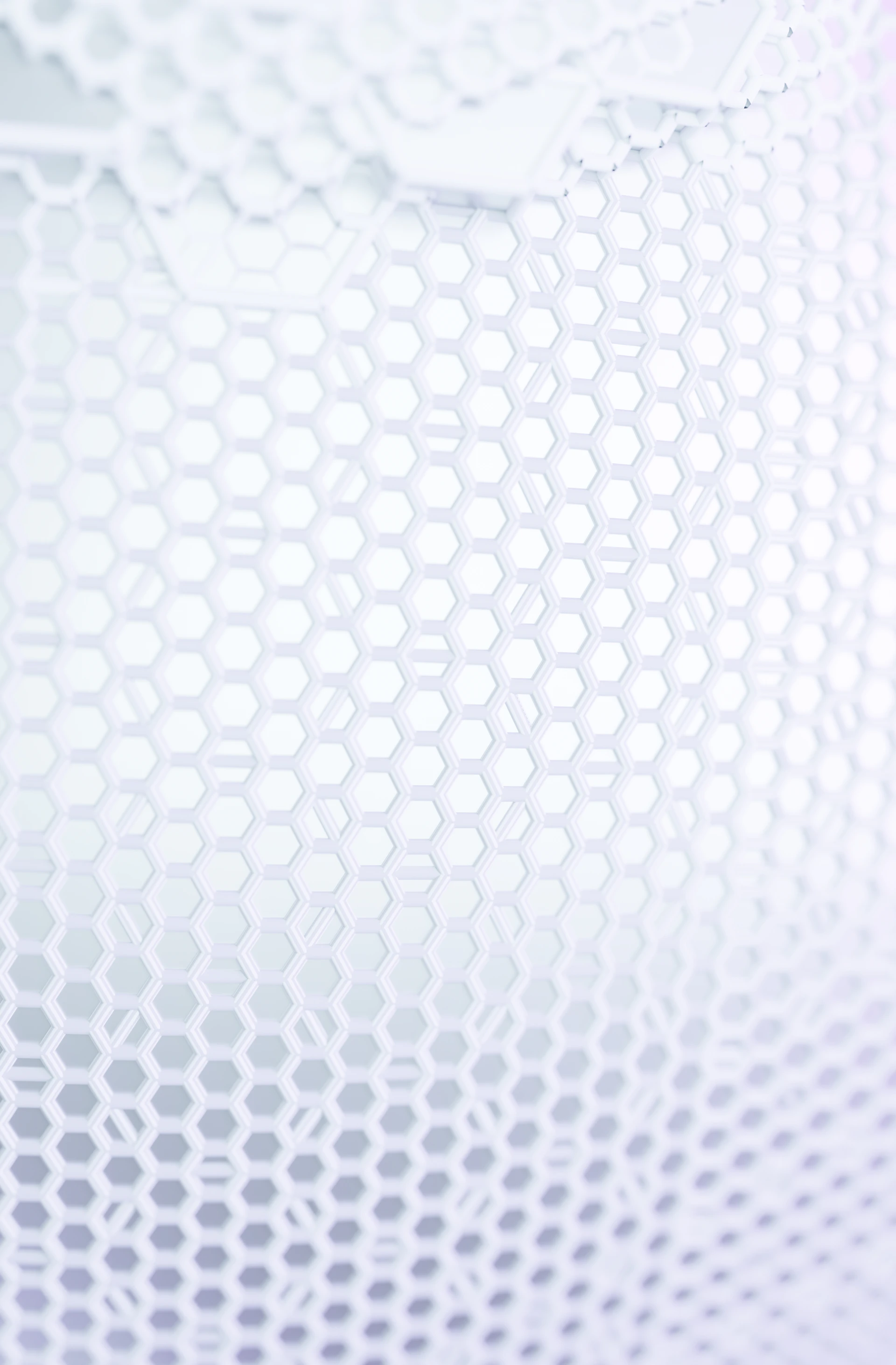 a close up of a cell phone on a white surface