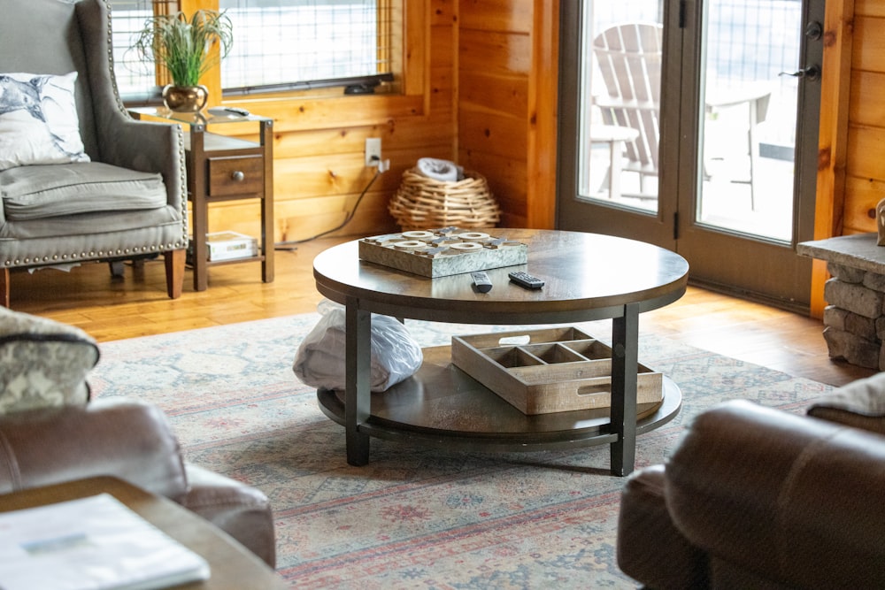 a living room filled with furniture and a fire place