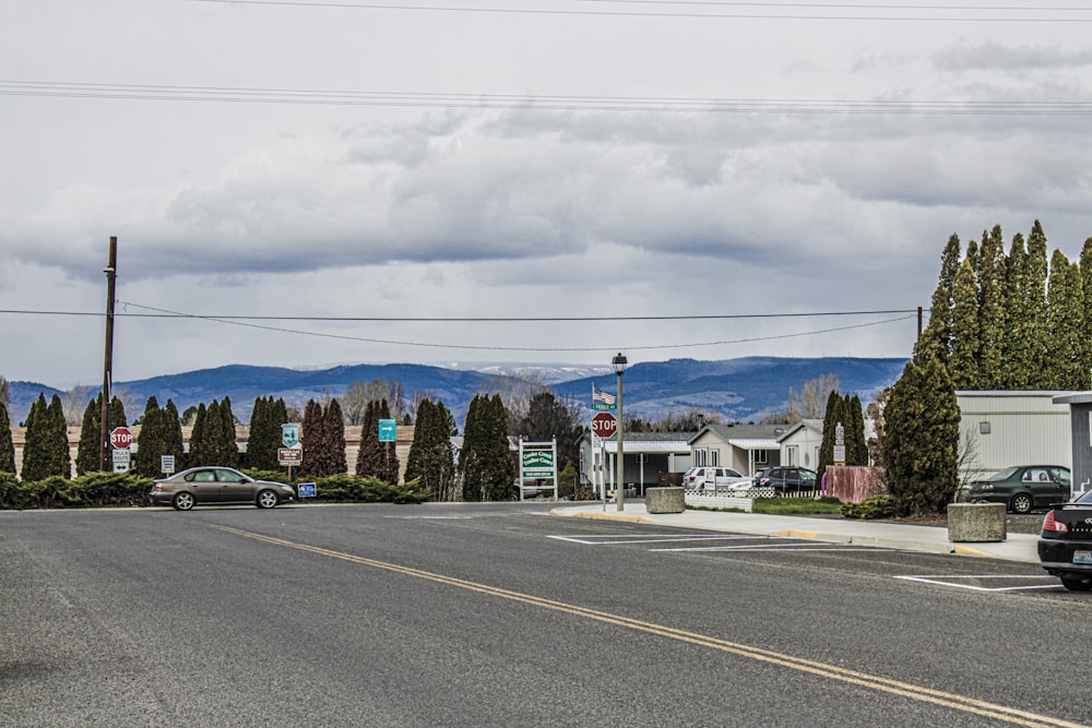 a street with cars parked on the side of it