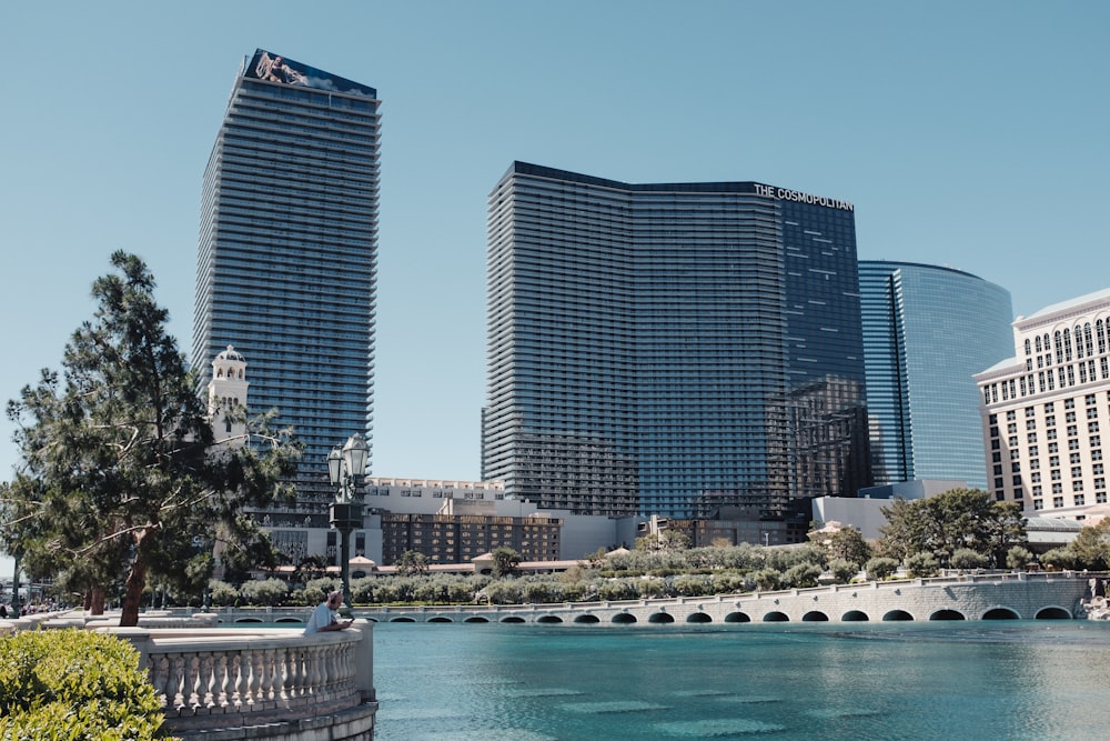 a body of water surrounded by tall buildings