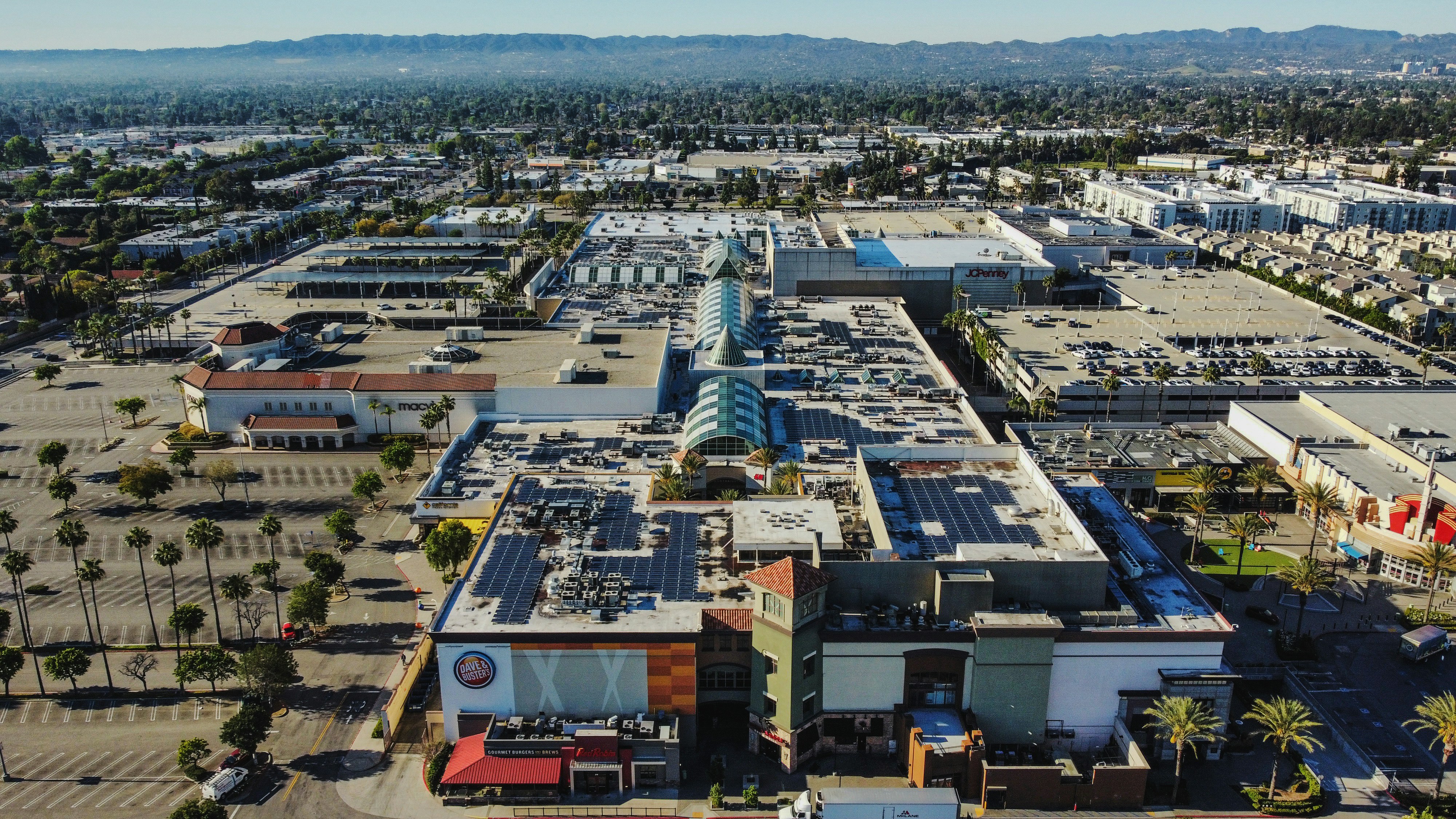 an aerial view of a parking lot in a city