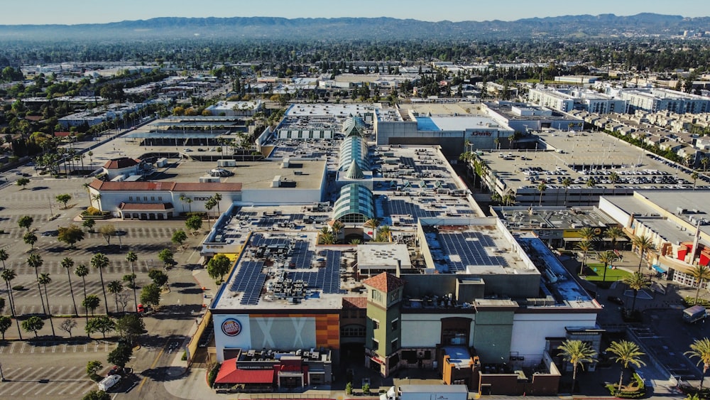 an aerial view of a parking lot in a city