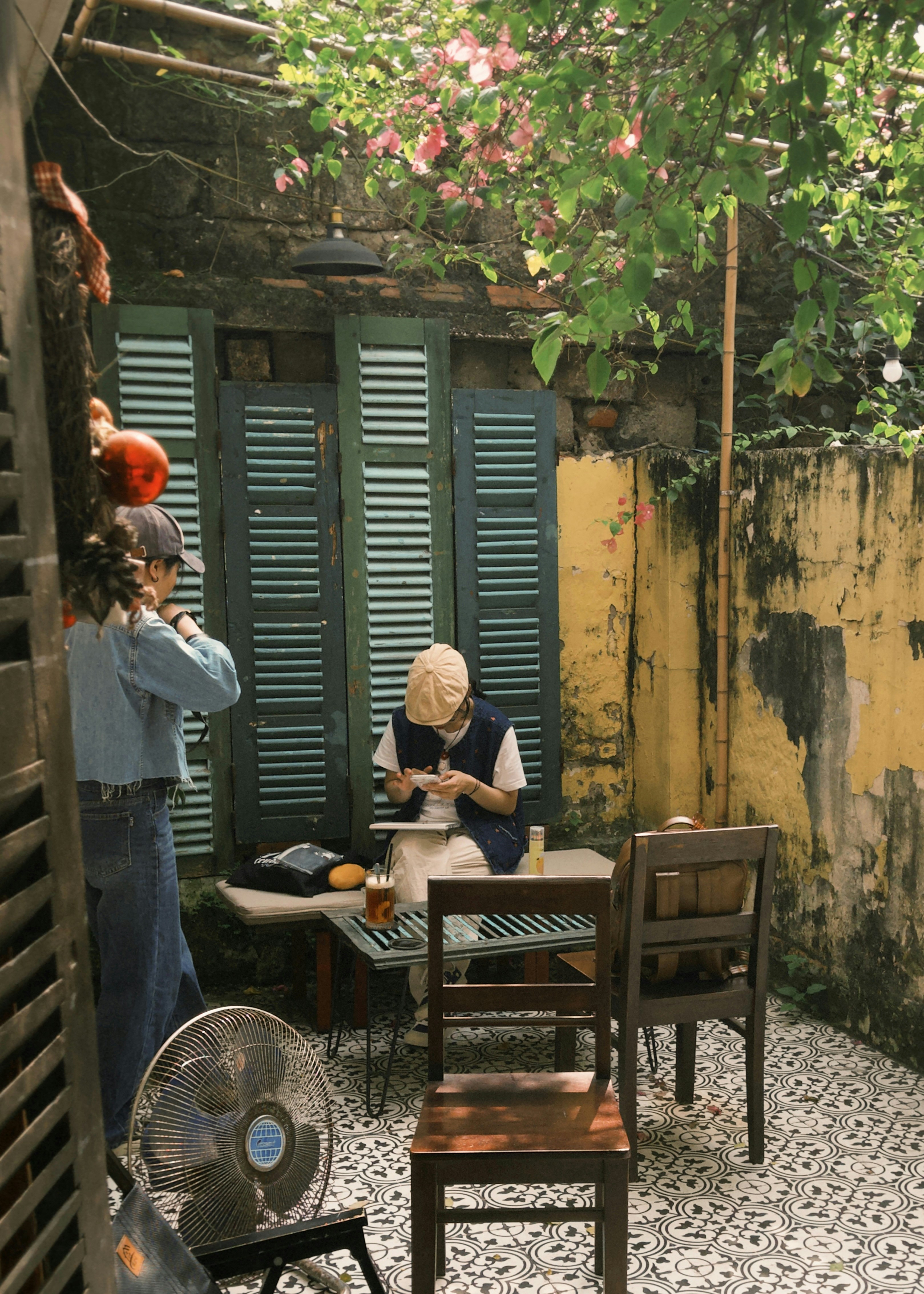 a couple of people sitting at a table