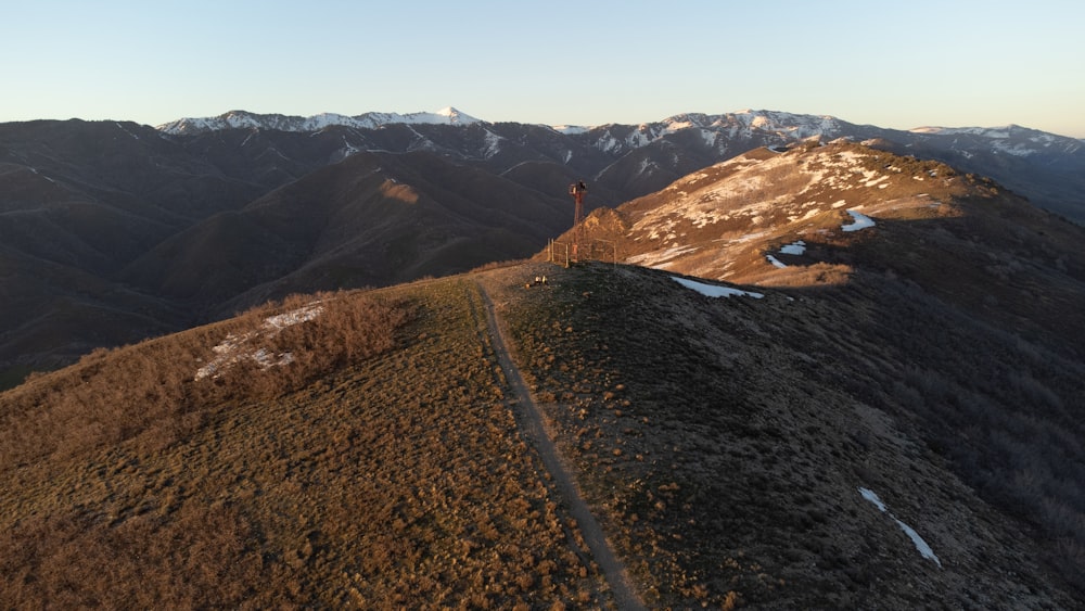 a person standing on top of a mountain