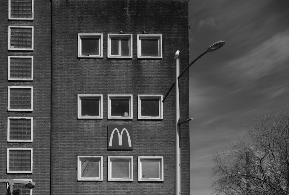 a black and white photo of a mcdonald's building