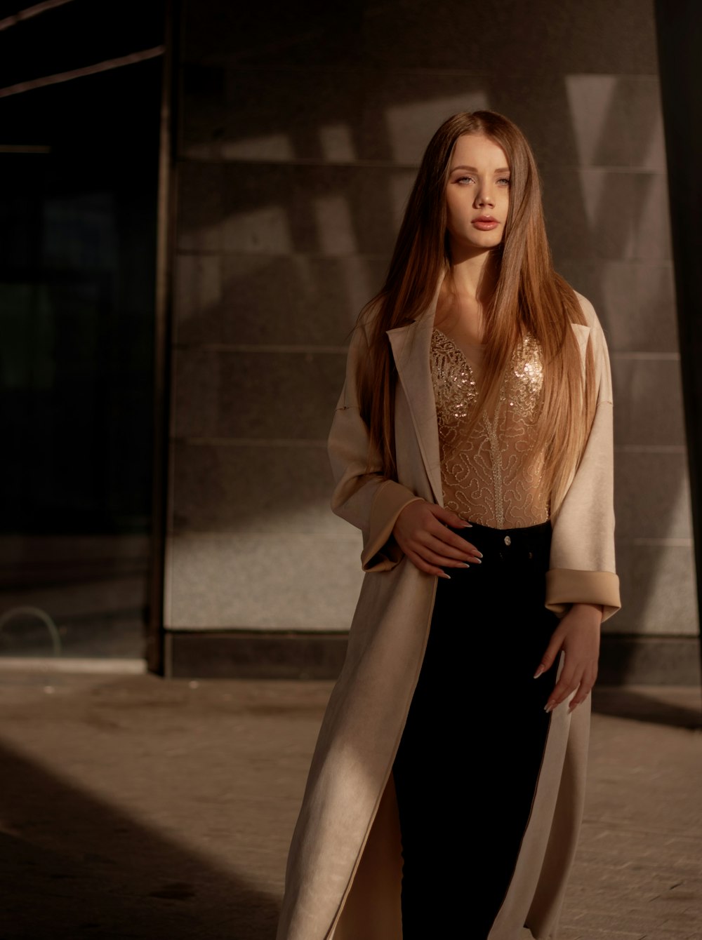 a woman standing in front of a building