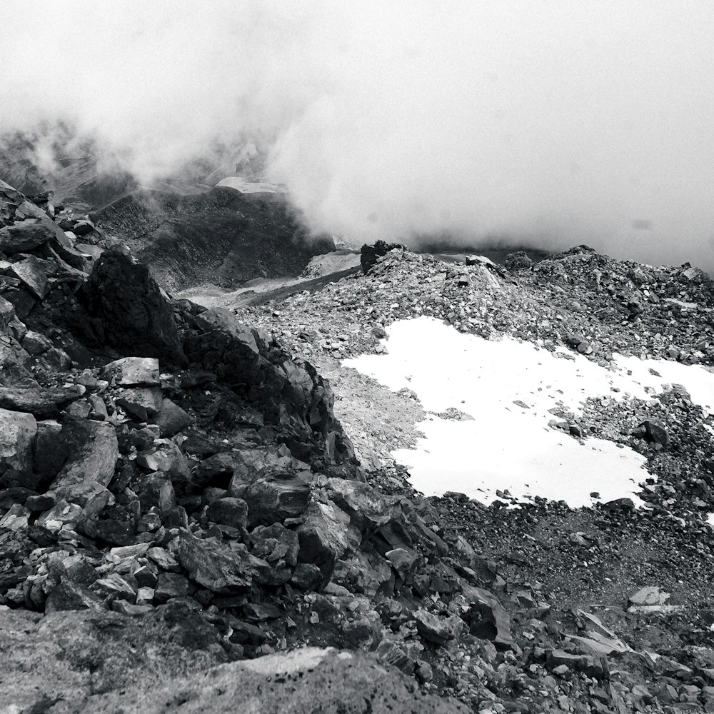 a black and white photo of a rocky mountain