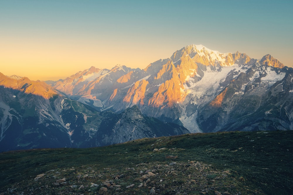 a view of a mountain range at sunset