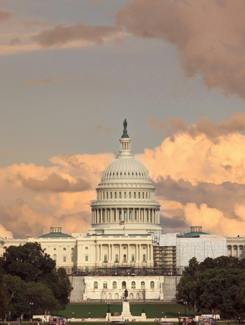 the capital building in washington d c with a cloudy sky