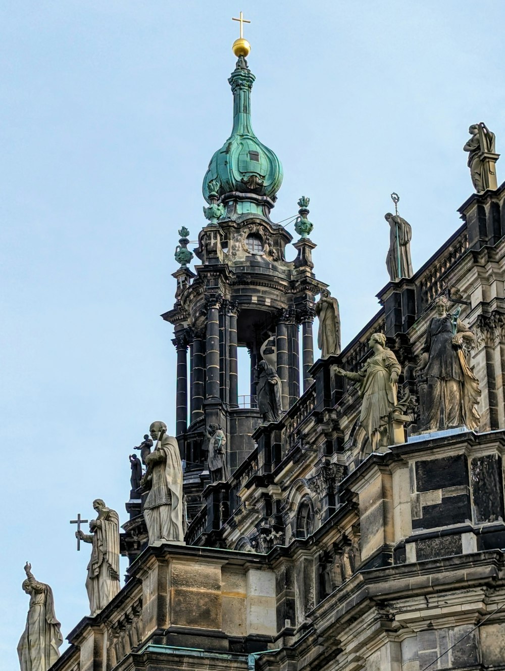 a tall building with a clock on the top of it