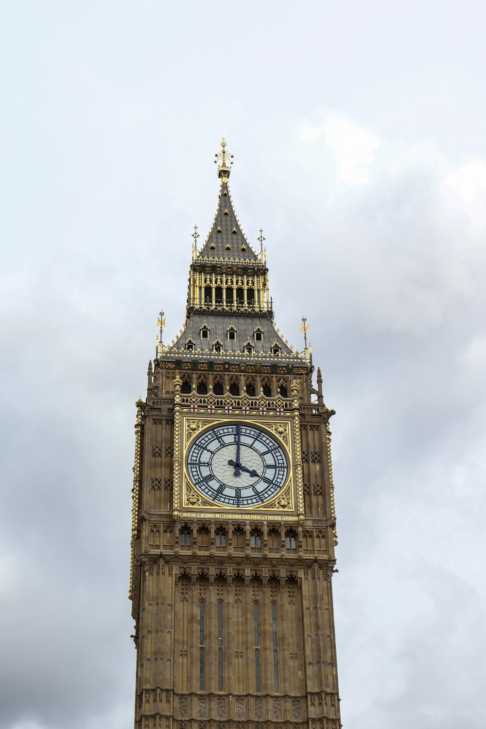 a tall clock tower with a sky background