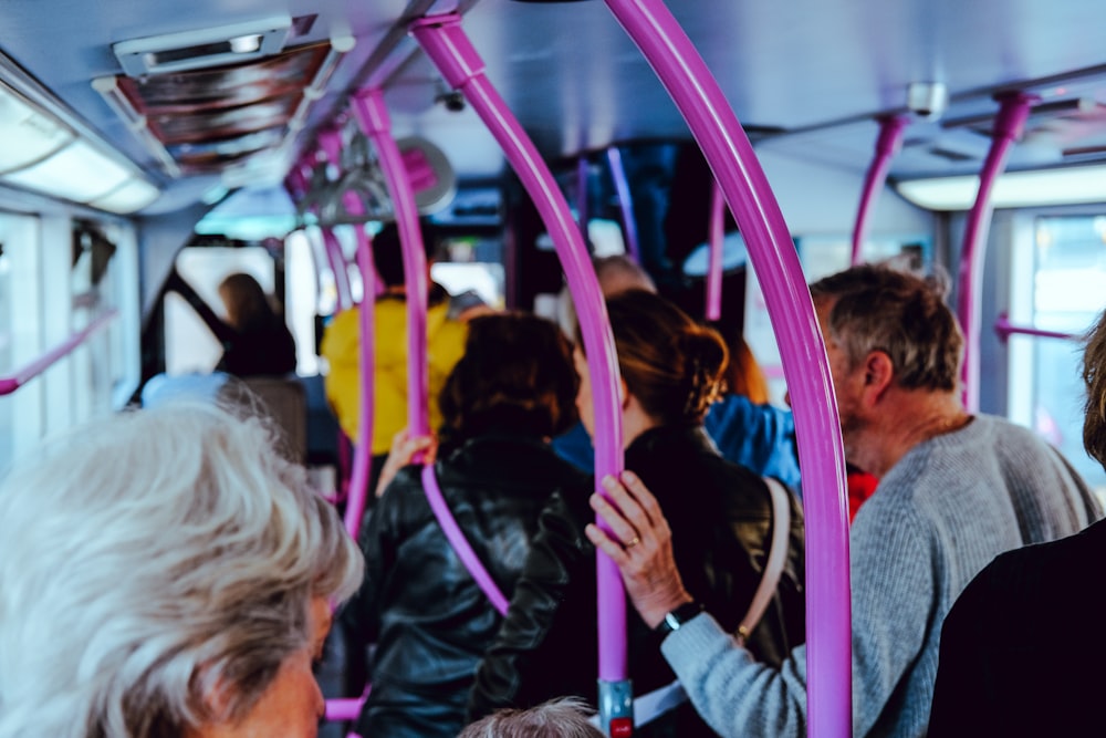 a group of people riding on a bus