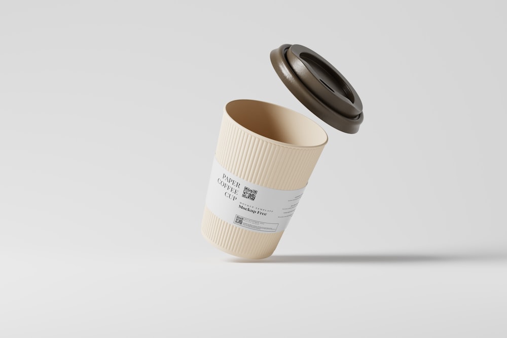 a coffee cup with a lid is shown