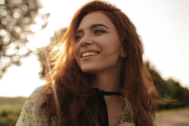 a close up of a person with long hair