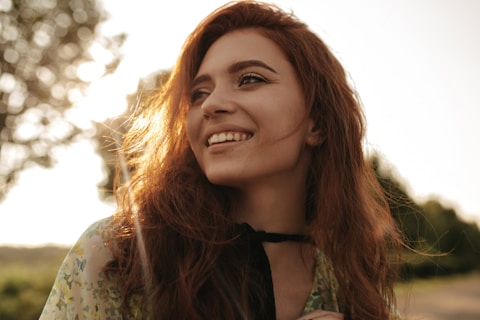 a close up of a person with long hair